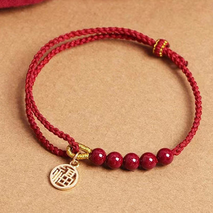 Pulsera trenzada hecha a mano con cuentas de cinabrio y carácter Fu de Buda con hilo rojo bendecido 