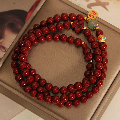 Pulsera de bendición de triple vuelta con calabaza, flor y personaje fu de cinabrio y piedras de Buda