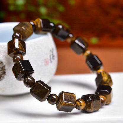 Pulsera protectora de ojo de tigre con piedras de Buda 