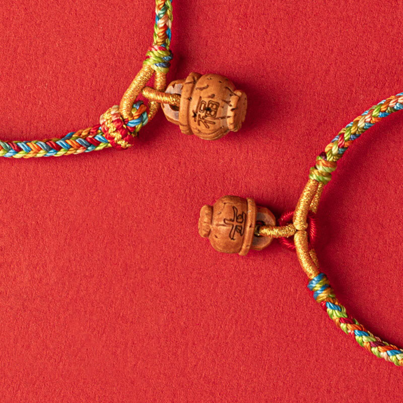Pulsera de Buda con piedras de madera de melocotón y carácter Fu para la seguridad y la prosperidad 