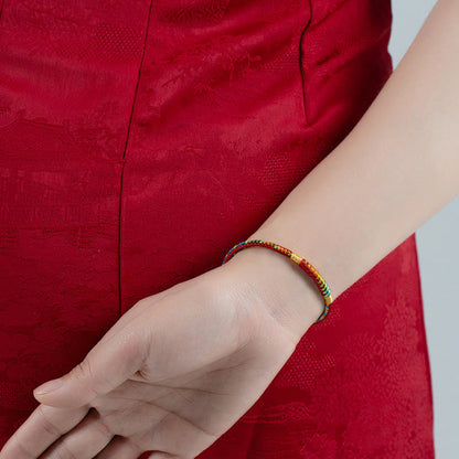 Pulsera de protección con hebilla de plata de ley 925 y hilo rojo multicolor con piedras de Buda 