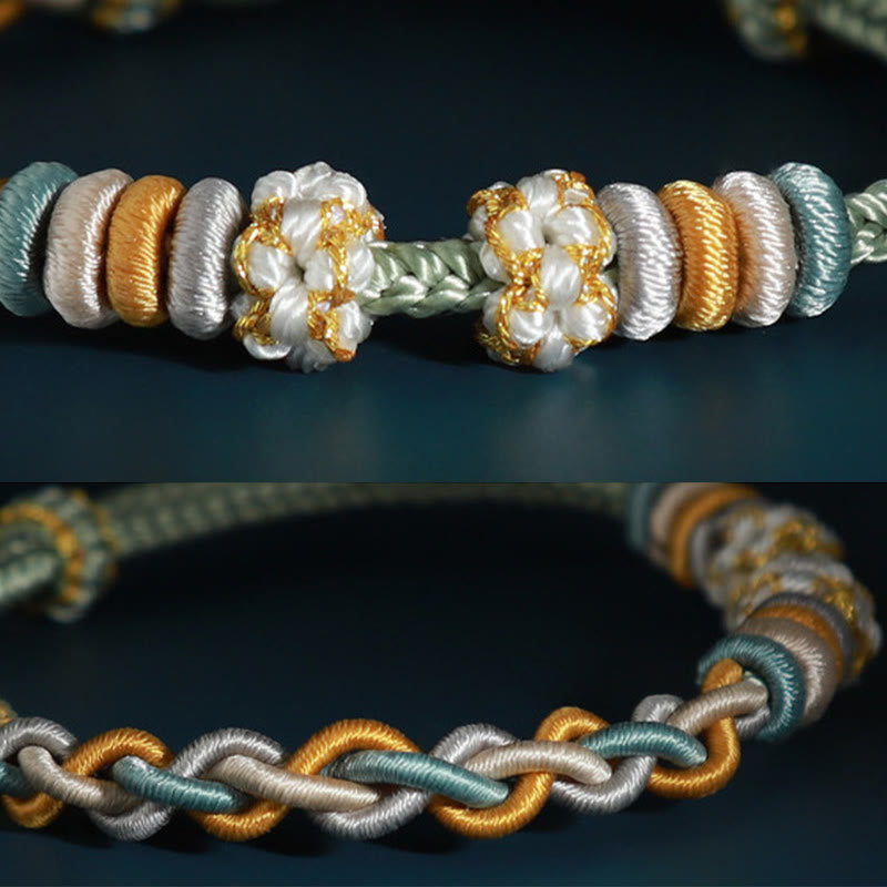 Pulsera de cuatro hilos con piedras de Buda y flor de durazno 