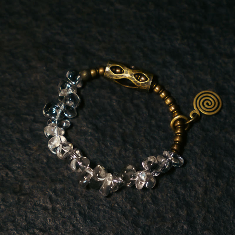 Pulsera de cobre con cristales blancos irregulares y piedras de Buda 