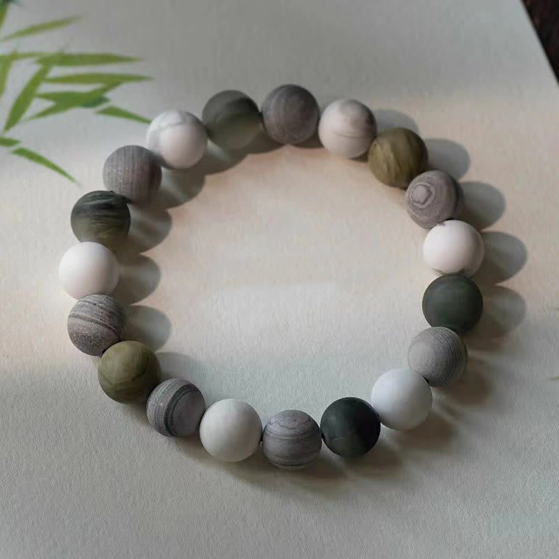 Pulsera de bendición con piedras de Buda, turquesa blanca, jaspe Picasso y calcita verde 
