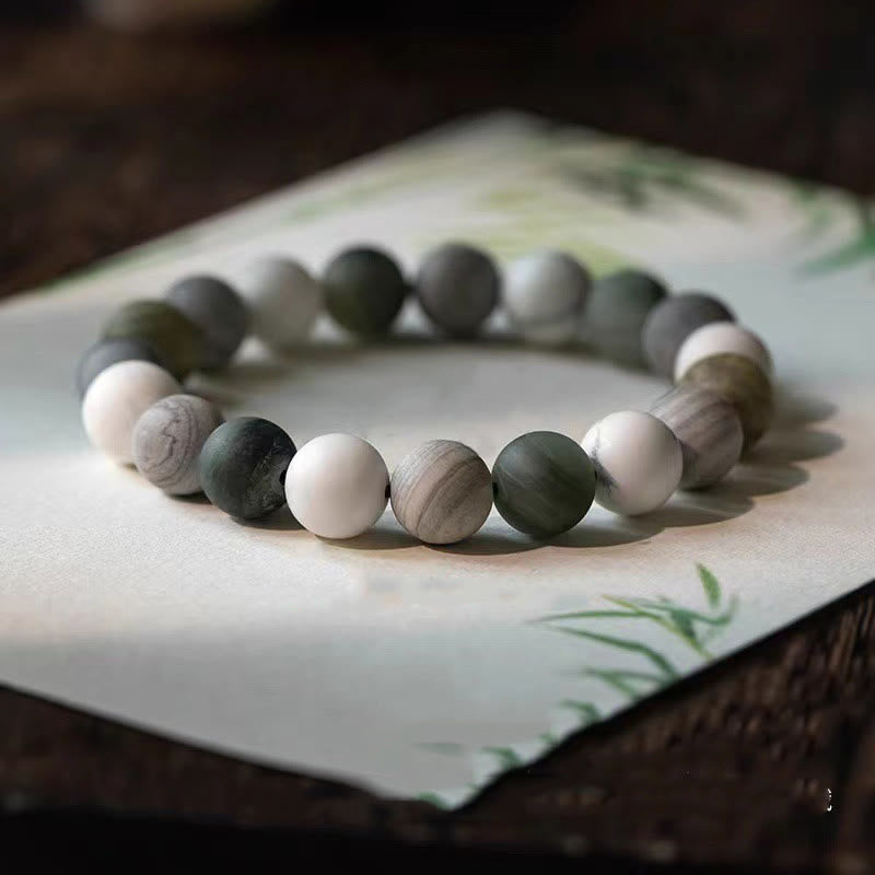Pulsera de bendición con piedras de Buda, turquesa blanca, jaspe Picasso y calcita verde 