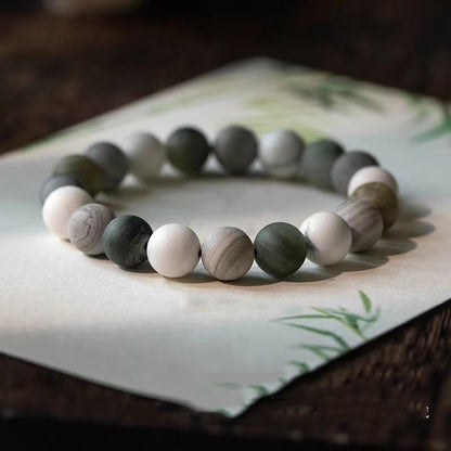 Pulsera de bendición con piedras de Buda, turquesa blanca, jaspe Picasso y calcita verde 