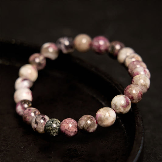 Pulsera de equilibrio de turmalina y flor de ciruelo con piedra de Buda