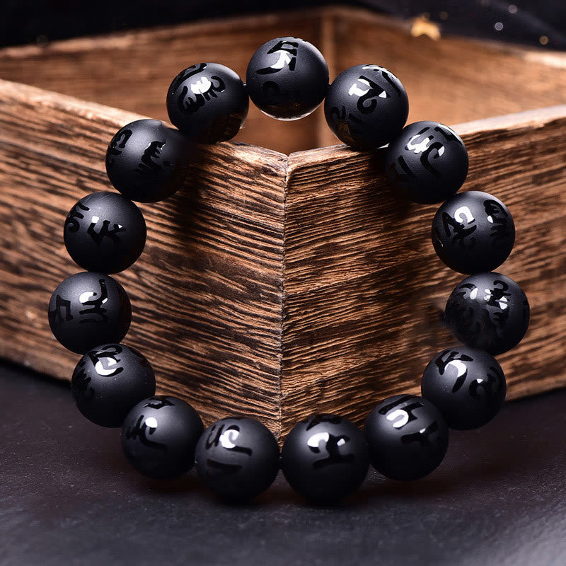 Buddha Stones Natürlicher schwarzer Onyx Om Mani Padme Hum geschnitztes Schutzarmband 