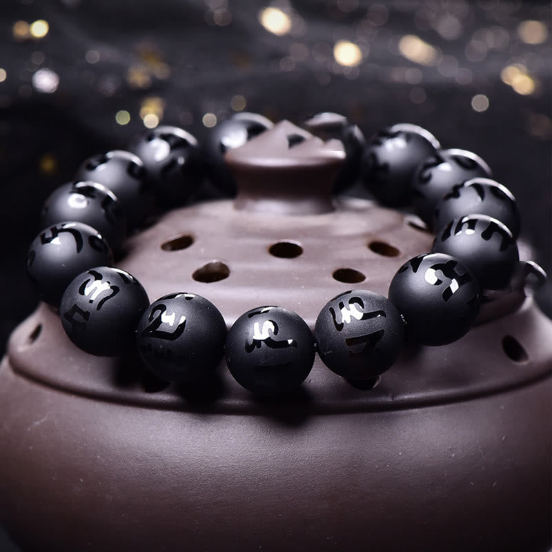 Buddha Stones Natürlicher schwarzer Onyx Om Mani Padme Hum geschnitztes Schutzarmband 