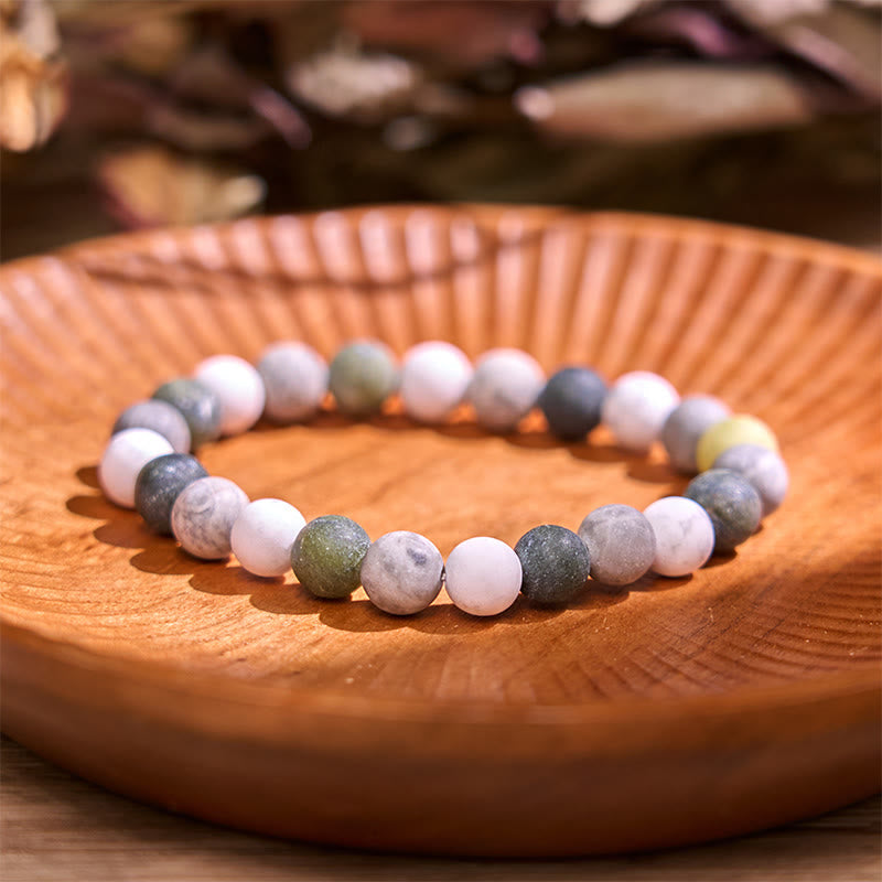 Pulsera de bendición con piedras de Buda, turquesa blanca, jaspe Picasso y calcita verde 
