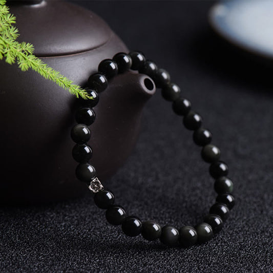 Buddha Stones Schwarze Obsidianperle 925 Sterling Silber Blumendesign Reinigungsarmband