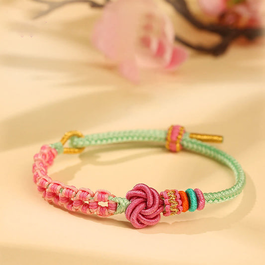 Buddha Stones Handgemachtes rosa-grünes geflochtenes Armband mit Pfirsichblütenknoten