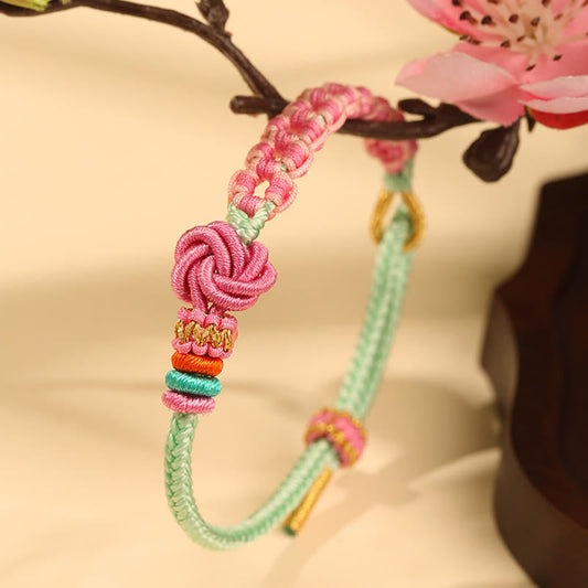 Buddha Stones Handgemachtes rosa-grünes geflochtenes Armband mit Pfirsichblütenknoten