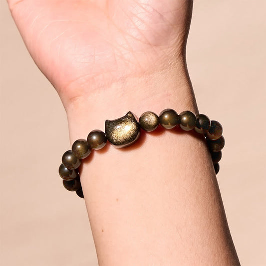 Pulsera de protección con piedras de Buda, obsidiana dorada y obsidiana plateada con brillo, con forma de pata de gato de la suerte. 