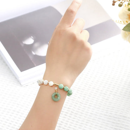 Pulsera de la abundancia con dije de hebilla de paz, caracol, herradura y jade de Buda