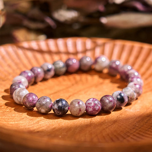 Pulsera de equilibrio de turmalina y flor de ciruelo con piedra de Buda