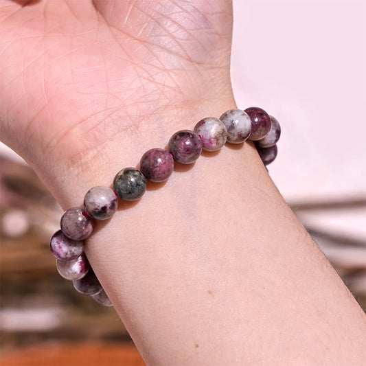 Pulsera de equilibrio de turmalina y flor de ciruelo con piedra de Buda