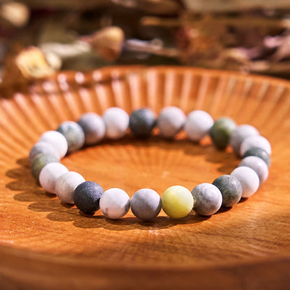 Pulsera de bendición con piedras de Buda, turquesa blanca, jaspe Picasso y calcita verde 