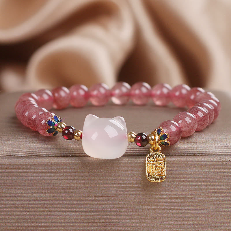 Pulsera curativa con piedras de Buda, cuarzo fresa y jade blanco, con el personaje de gato Fu 