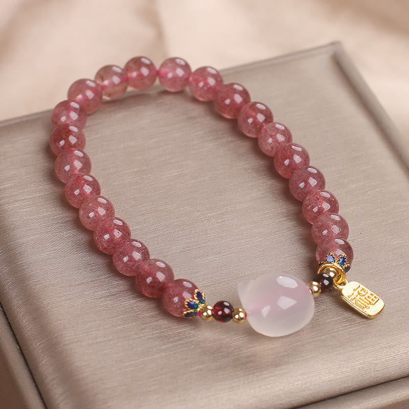 Pulsera curativa con piedras de Buda, cuarzo fresa y jade blanco, con el personaje de gato Fu 