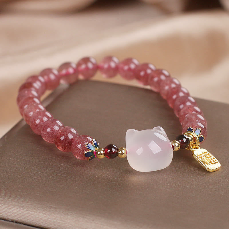Pulsera curativa con piedras de Buda, cuarzo fresa y jade blanco, con el personaje de gato Fu 