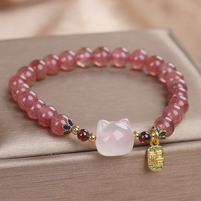 Pulsera curativa con piedras de Buda, cuarzo fresa y jade blanco, con el personaje de gato Fu 