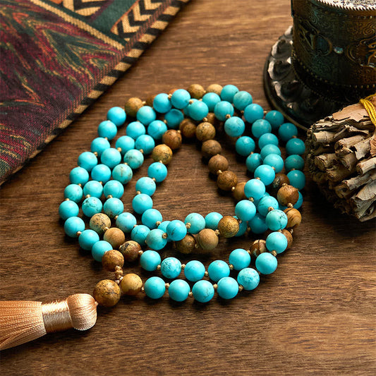 Pulsera de equilibrio con borlas de cuentas de jaspe turquesa y 108 cuentas de mala de Buda