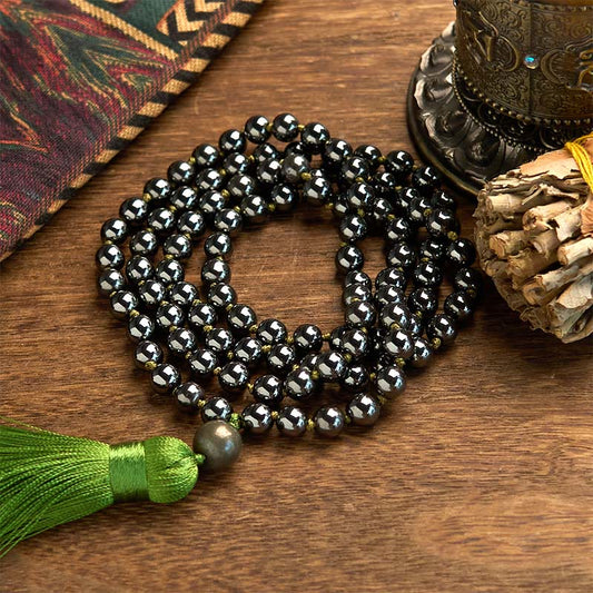 Pulsera poderosa con borla de hematita y 108 cuentas de mala de Buda 