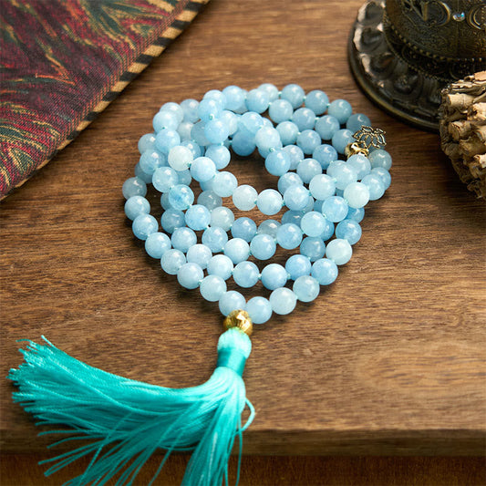 Pulsera de curación de loto con borla de aguamarina y 108 cuentas de mala de Buda 