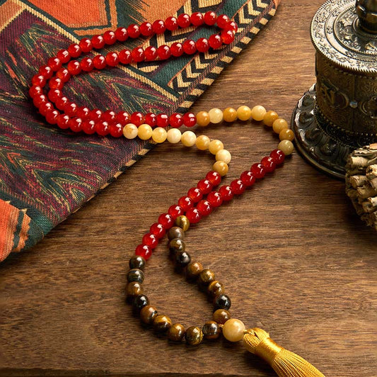 Pulsera de piedra de Buda con 108 cuentas de mala, ágata roja, ojo de tigre y borla amarilla. 