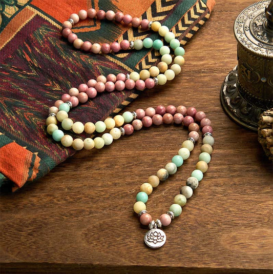 Pulsera de compasión de loto con 108 cuentas de amazonita y rodonita de Buddha Stones