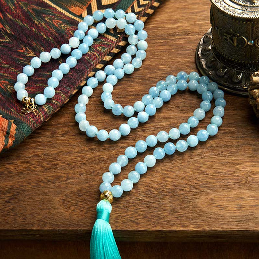 Pulsera de curación de loto con borla de aguamarina y 108 cuentas de mala de Buda 
