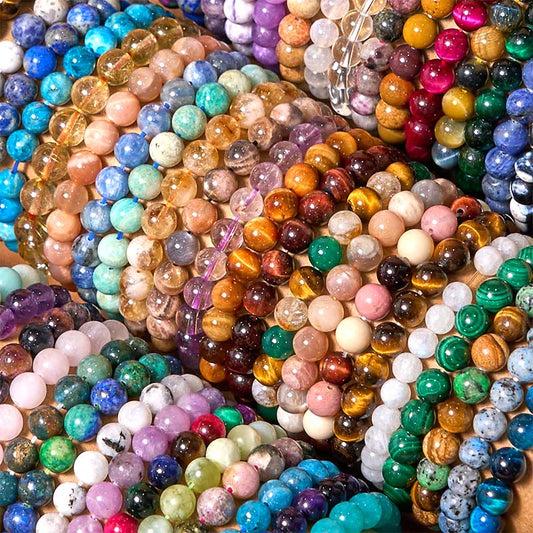 Pulsera de la calma con piedra de Buda, varios cristales, malaquita, lazurita y hemimorfita