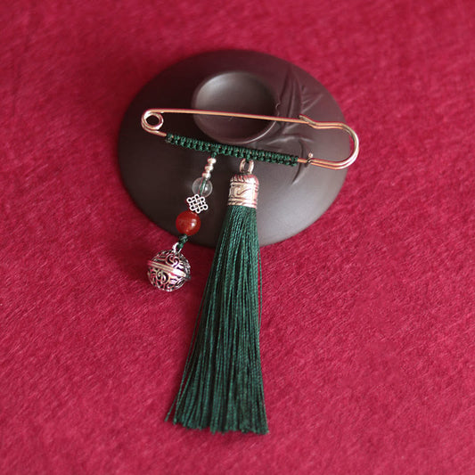 Broche con borlas de campana retro de piedras de Buda