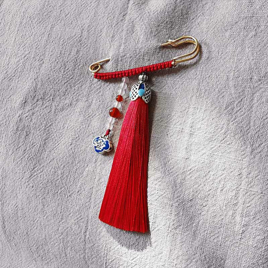 Broche con borlas y cuentas de calcedonia vintage de Buda