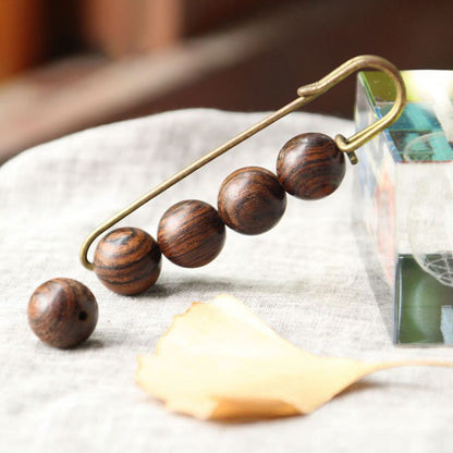 Buddha Steine ​​Vintage Sandelholz Agathis Alba Ebenholz Holz Peltogyne Perlen Heilung Brosche