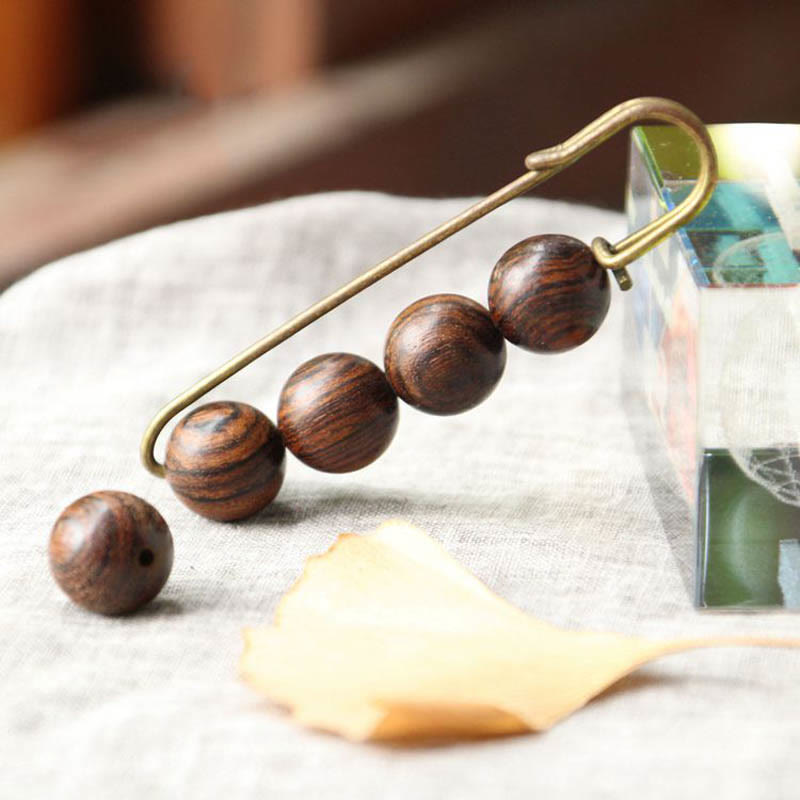 Buddha Steine ​​Vintage Sandelholz Agathis Alba Ebenholz Holz Peltogyne Perlen Heilung Brosche