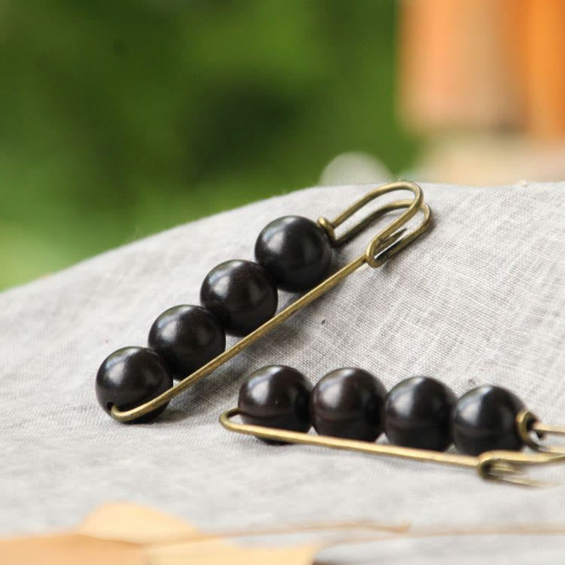 Buddha Steine ​​Vintage Sandelholz Agathis Alba Ebenholz Holz Peltogyne Perlen Heilung Brosche