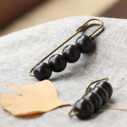 Buddha Steine ​​Vintage Sandelholz Agathis Alba Ebenholz Holz Peltogyne Perlen Heilung Brosche