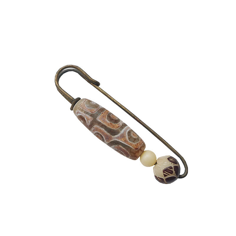 Broche protector de loto con semillas de bodhi y cuentas Dzi de nueve ojos de Buda