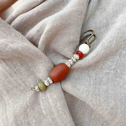 Broche de ágata con semillas de bodhi y piedras de Buda para una armonía tranquila