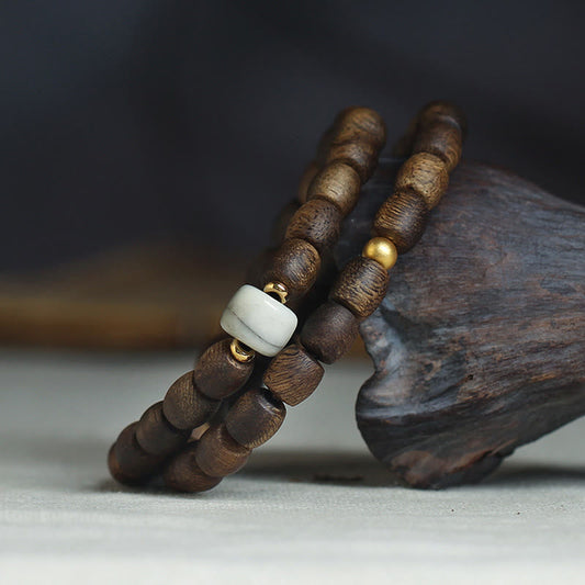 Buddha Stones 999 Gold Seltenes Tarakan-Adlerholz Tibetischer Alter Geistknochen Gleichgewicht Stärke Doppelwickelarmband