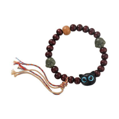 Pulsera de madera con borlas de la paz, con piedras de Buda, madera de ébano y pata de jade de gato encantador 