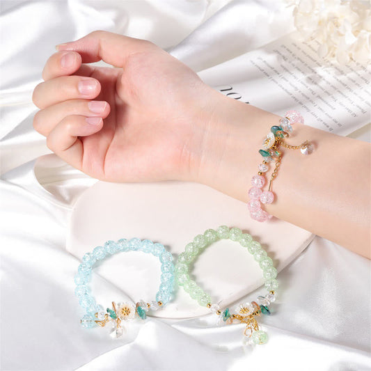 Pulsera de cuentas de vidrio con diseño simple de piedras de Buda y dijes de flores