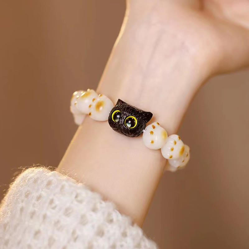 Pulsera de la paz con semillas de bodhi naturales de Buda, sándalo rojo, gato de la suerte y pata encantadora 