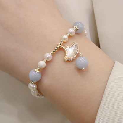 Pulsera con dije de mariposa, hoja de ginkgo y perla de aguamarina natural de Buda 