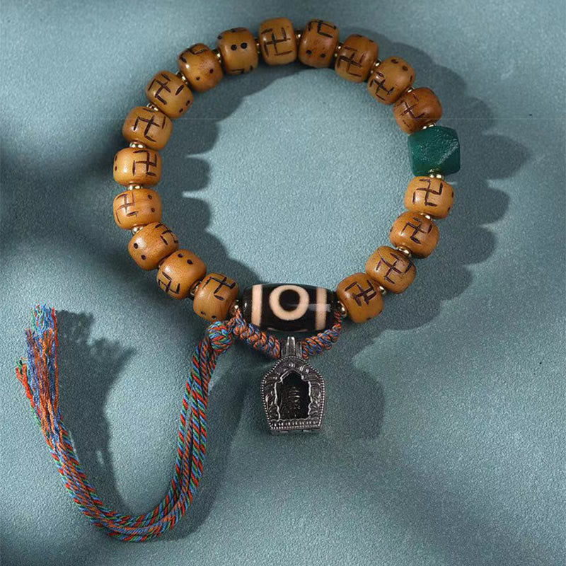 Buddha-Steine, natürliches tibetisches Kamelknochen-Hakenkreuz-Dzi-Perlen-Shankha-Buddha-Charm, Kirtimukha-Glücksschutz-Quastenarmband
