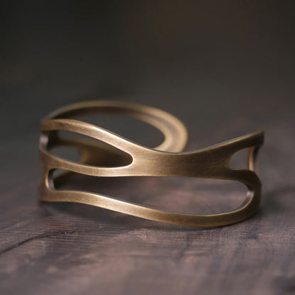 Brazalete ajustable de cobre y latón con piedras de Buda, estilo vintage, curvado y con símbolo de riqueza