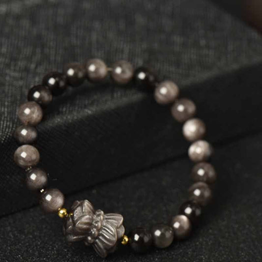 Pulsera protectora de Buda sonriente con flor de loto, obsidiana plateada y zorro de nueve colas