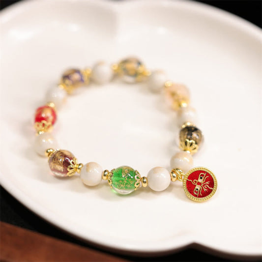 Pulsera tibetana con cuentas de porcelana, ceniza de incienso y cuentas de vidrio de Liuli, con piedras de Buda y los cinco dioses de la riqueza y la fortuna.
